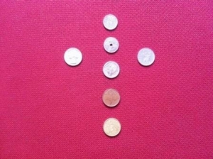 A cross of coins
